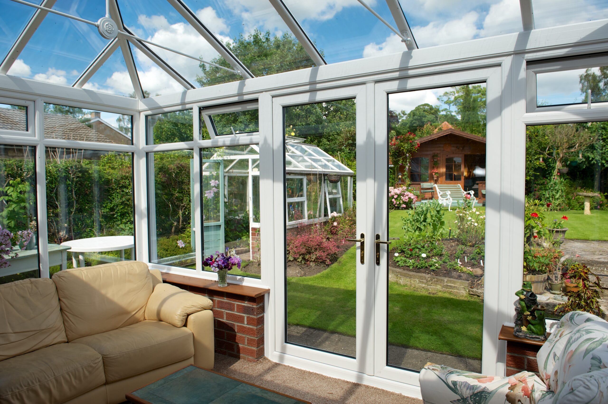 Conservatory connected to the house and garden